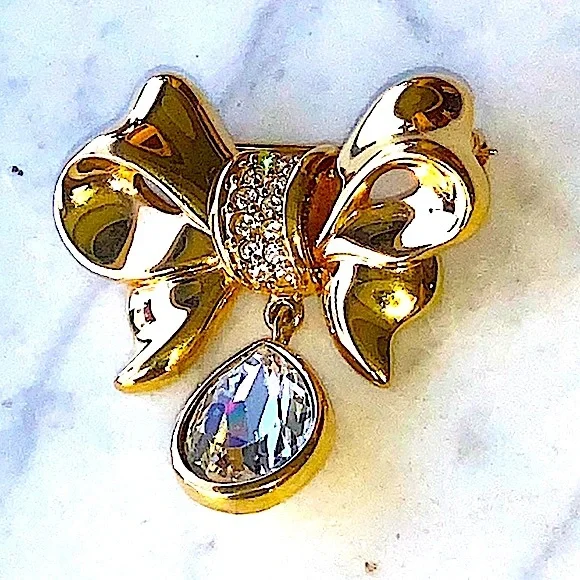 SWAROVSKI BOW BROACH CLEARCRYSTAL TEAR DROP GOLD MARKED SWAN